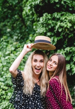 Two girls in a summer park photo