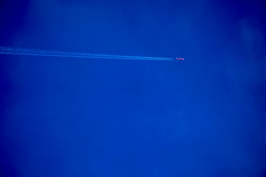Clearly beautiful blue sky with white line plane. photo