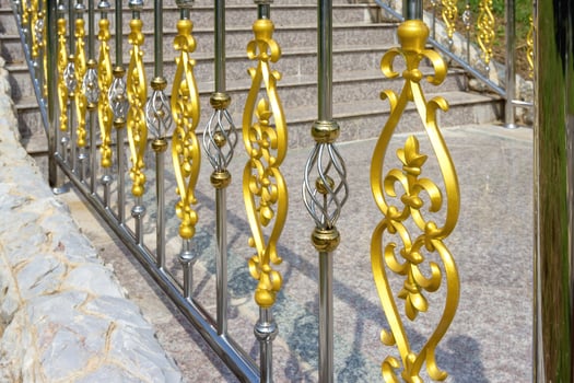 stainless fence with ornament of gold photo