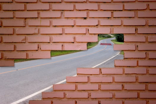 deadlock with brick wall and road photo