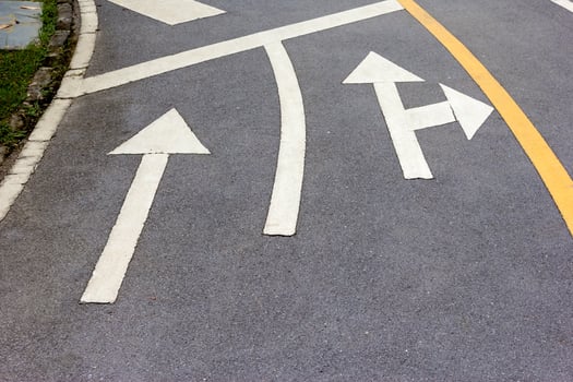 asphalt road with white arrow. photo