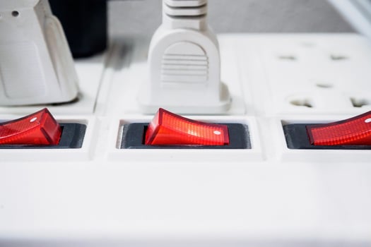 Multiple socket with connected plugs photo