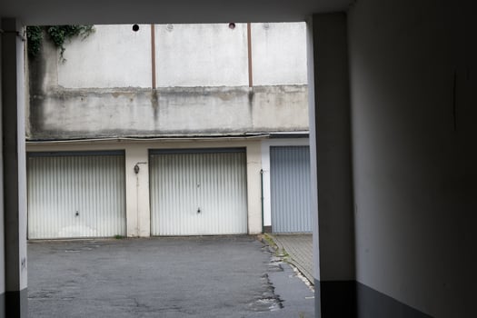garage courtyard with two old gates photo