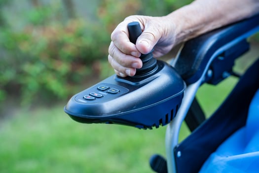 Asian senior or elderly old lady woman patient on electric wheelchair with remote control at nursing hospital ward, healthy strong medical concept photo