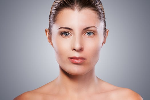 Before and after. Portrait of beautiful mature woman with half face make-up standing against grey background photo