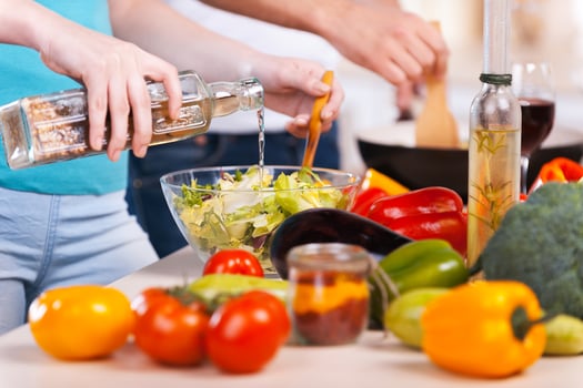 Cooking together. Close-up of couple preparing food together photo