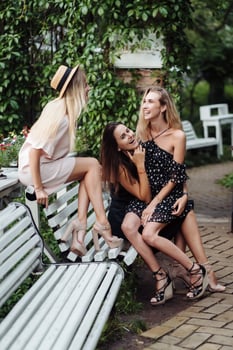 three girls on the bench photo
