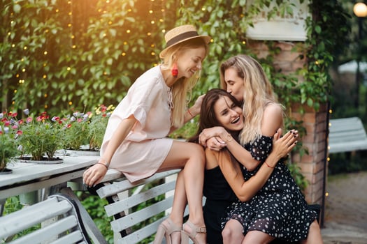 three girls on the bench photo