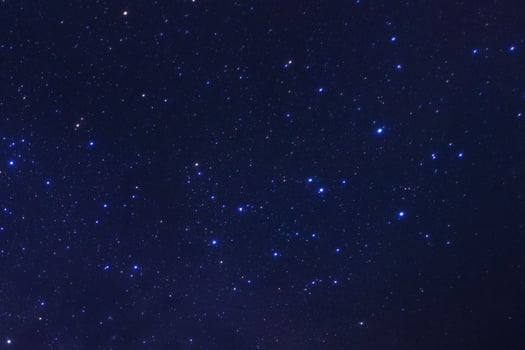Starry night sky, Milky way galaxy with stars and space dust in the universe, Long exposure photograph, with grain. photo