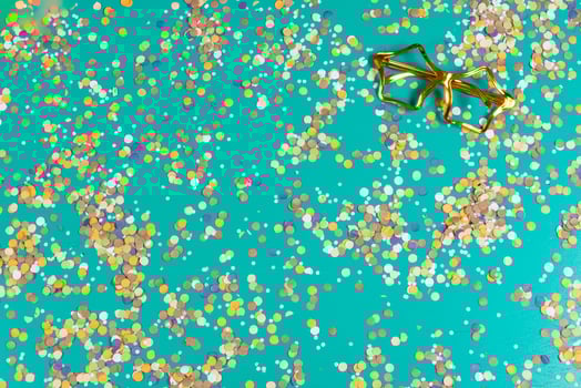 Background of confetti with elements related to the carnival and summer photo