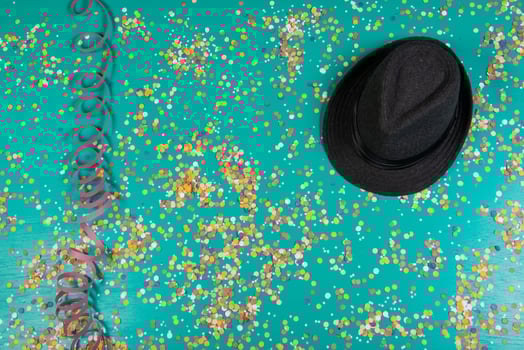 Background of confetti with elements related to the carnival and summer photo