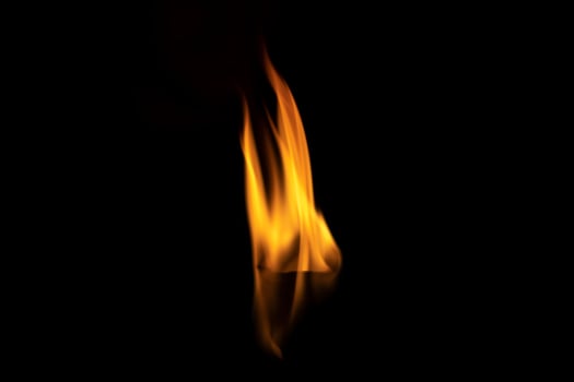 Fire on black background. Flames in dark. Details of fire. photo