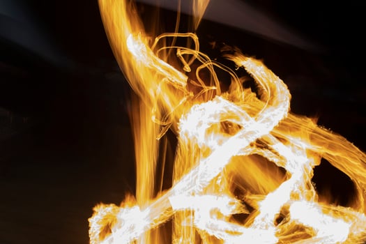 Lines of fire on black background. Flames in dark. photo