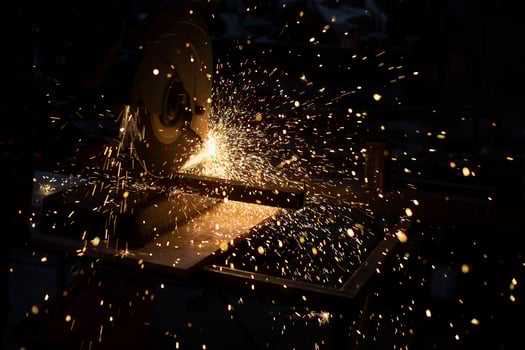 Sparks from metal. Lots of sparks from grinding steel. photo