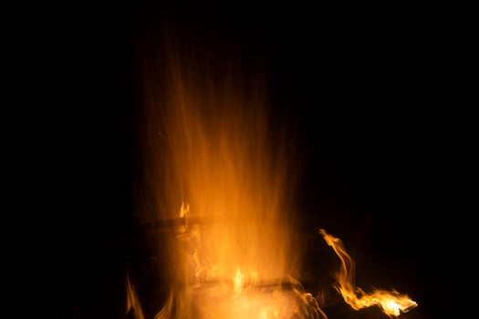 Texture of fire. Flames in night. Burning firewood. photo