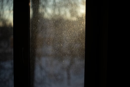 Curtain on window in morning. Dawn outside window. photo