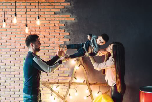 young family having fun at home photo
