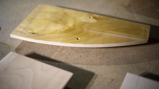 Board on table. Details of carpentry workshop. Wood processing. photo