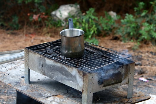 Vegetables and meat are fried on the grill. photo