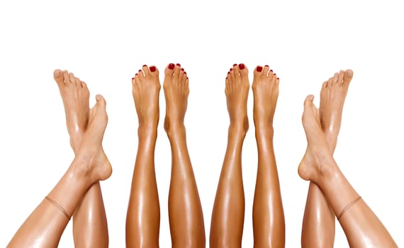 Group of beautiful, smooth women's legs after laser hair removal. Treatment, technology concept photo