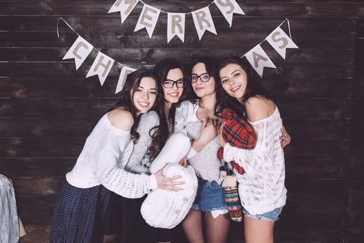 Cute girl hug and pose for the camera. Christmas background photo