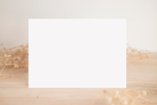 Greeting card mockup with dry leaves and branch  wedding cards  birthday card  Mockup for design photo