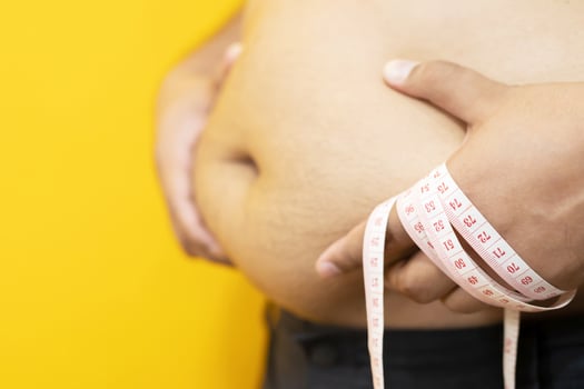 Obese man want to exercise and control weight. photo