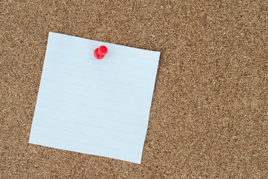 collection of colorful variety post. paper note reminder sticky notes pin on cork bulletin board. photo