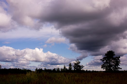landscape with majestic beautiful dramatic pre-threatening sky. Cloudy sky photo