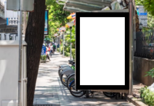 Outdoor billboard with mock up white screen on bus stop and clipping path photo