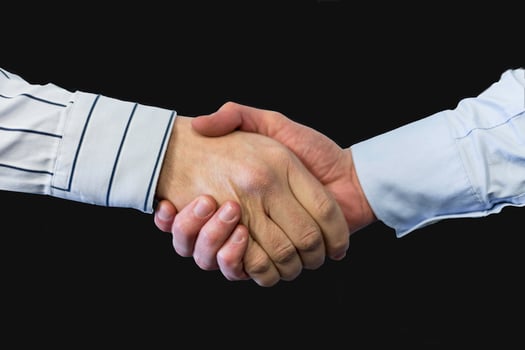 Handshake agreement from two man photo
