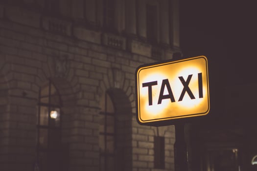 Taxi written on sign photo