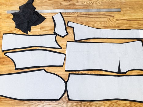 cut dress details with paper layouts on table photo