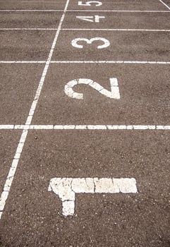 Numbers on a running track photo