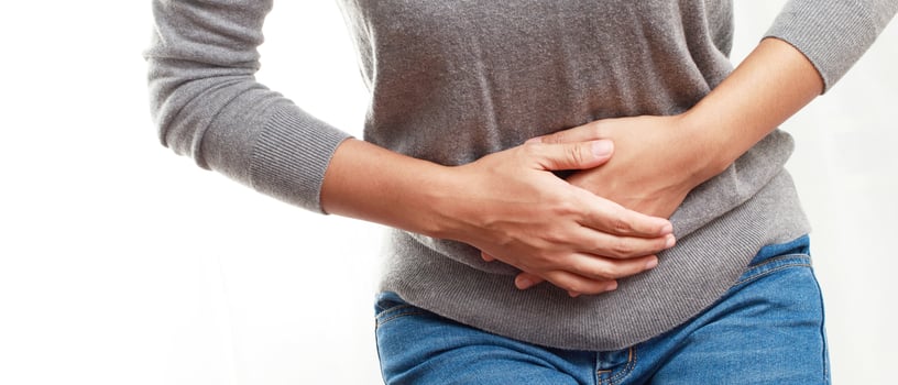 Woman having a stomachache, or menstruation pain. suffering from abdominal. Menstrual cramps. Healthcare and medical, gynecology concept. photo