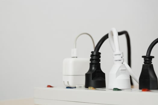 Electrical appliances plugs full of all plugs or plugs together. Because of the risk of causing a short circuit from high heat accumulated in the wires. photo