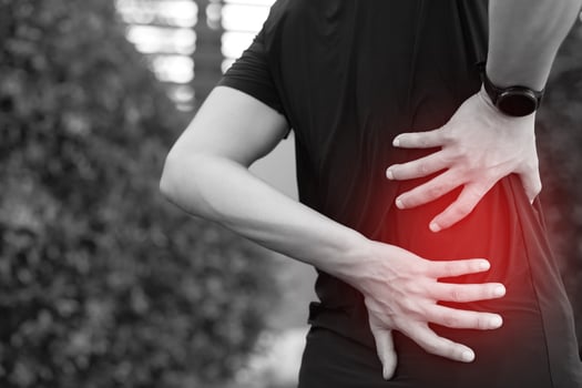 Lower back pain is usually caused by a muscle injury. broken pillow photo