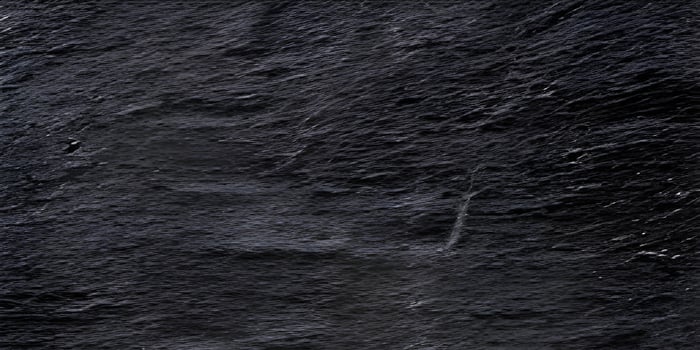 Dark gray rustic surface texture copy space. photo