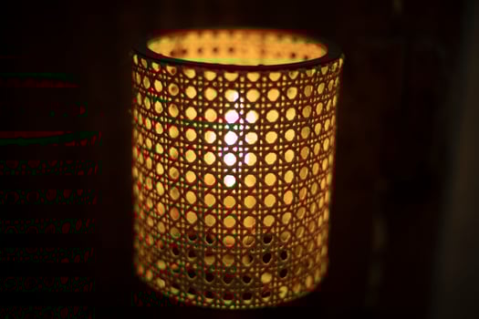 Lamp with wooden lampshade. Beautiful lamp in dark. photo