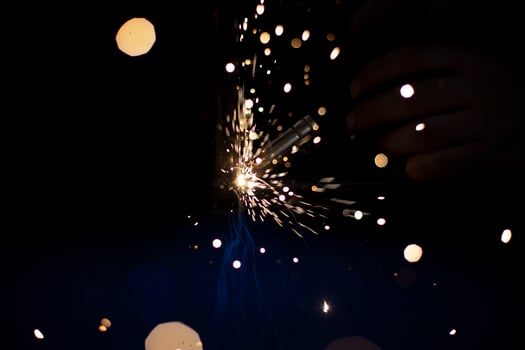 Welding work. High temperature. Hot steel. Metal welding. Production details. photo