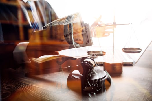 justice and law concept.Male judge in a courtroom on wooden table and Counselor or Male lawyer working in office. Legal law, advice and justice concept. photo