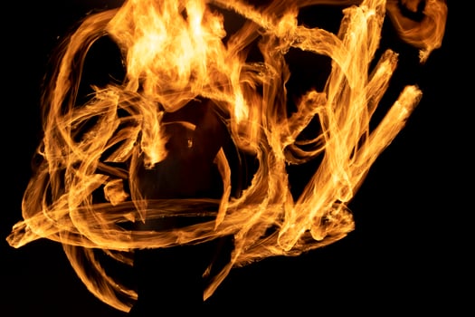 Lines of fire on black background. Flames in dark. photo