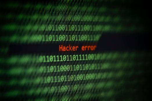 Hacked computer technology binary code number data alert Hacker error on display screen photo