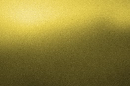 Shiny gold foil or gold texture luxury background golden yellow metal. abstract texture. photo