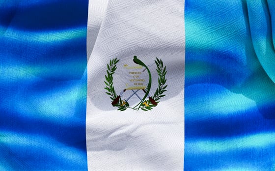 Guatemala flag - realistic waving fabric flag photo