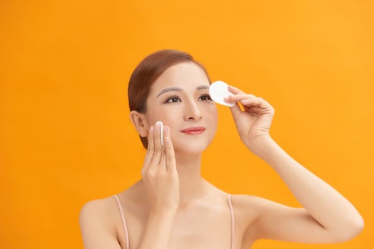 woman face cotton pad skin photo