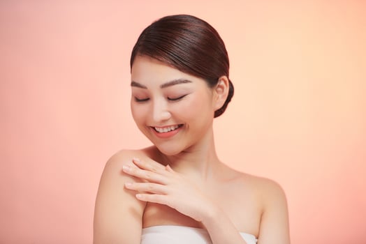 Beautiful Young Asian Woman with Clean Fresh Skin photo