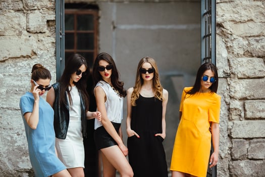 Five young beautiful girls in the city photo