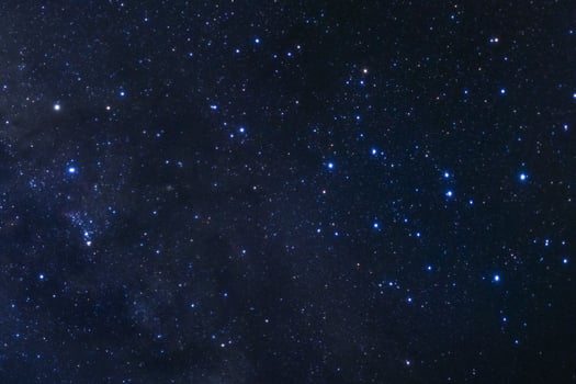 Starry night sky, Milky way galaxy with stars and space dust in the universe, Long exposure photograph, with grain. photo