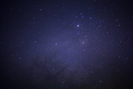 Starry night sky and milky way galaxy with stars and space dust in the universe photo